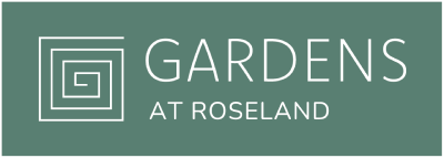 A logo with the words "GARDENS AT ROSELAND" in white text on a green background.
